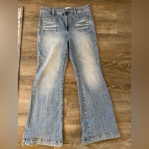 Risen SZ 31 light wash high waist flared jeans. Like new